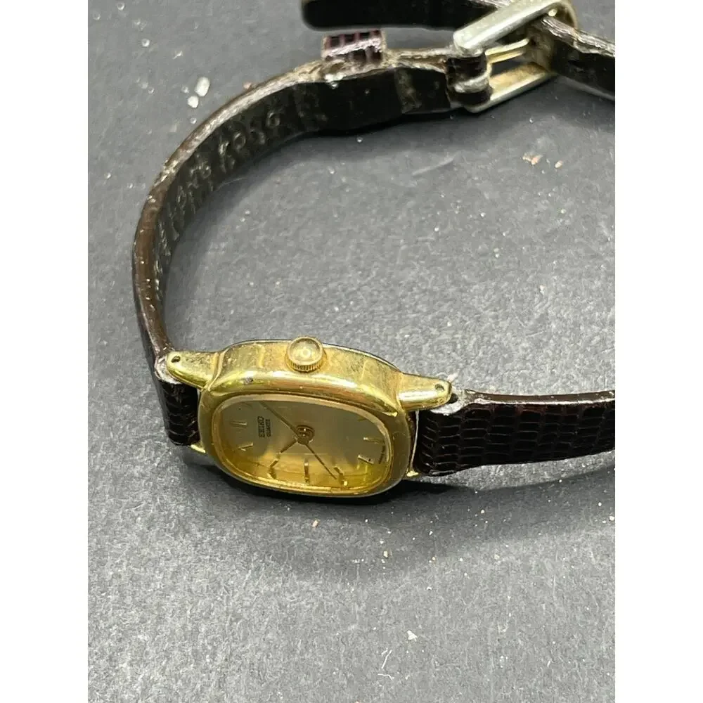 Vintage Seiko Watch Women's Champagne Dial Gold Tone Oval 4N01-5819 Brown Band